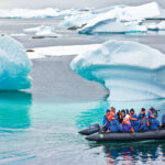 Guests exploring Antarctica via Zodiac